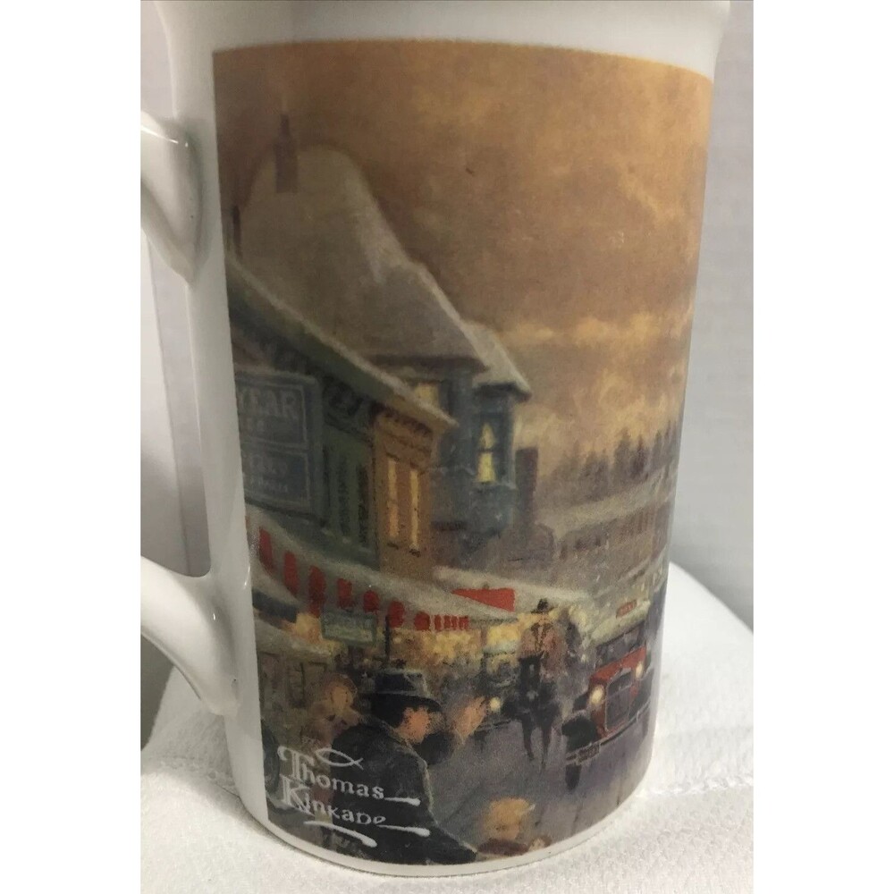 Thomas Kinkade tall coffee mug Christmas on Main Street.  1990